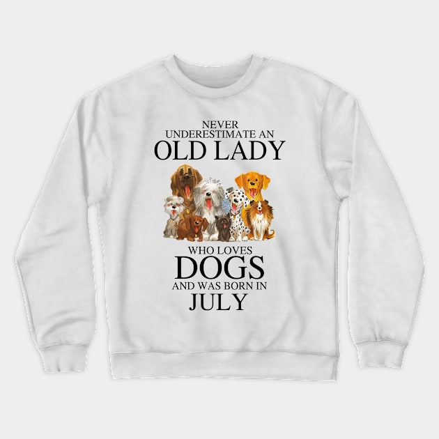 Never Underestimate An Old Lady Who Loves Dogs And Was Born In July Crewneck Sweatshirt by louismcfarland